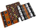 Three folded pieces of African wax print fabric with traditional patterns in orange, black, white, and yellow, displayed on a clean white background.