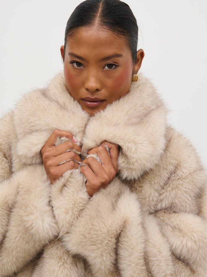 Elle Is 5'3" & Wears Size UK XS|Agatha Short Faux Fur Coat - Beige Marl