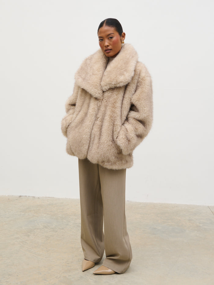 Elle Is 5'3" & Wears Size UK XS|Agatha Short Faux Fur Coat - Beige Marl