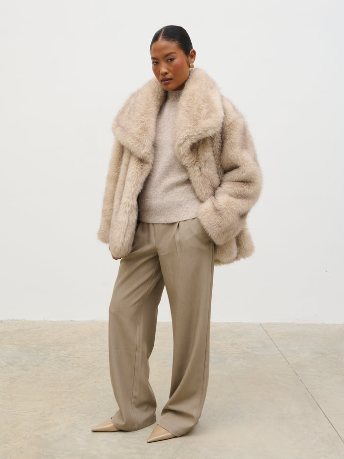Elle Is 5'3" & Wears Size UK XS|Agatha Short Faux Fur Coat - Beige Marl