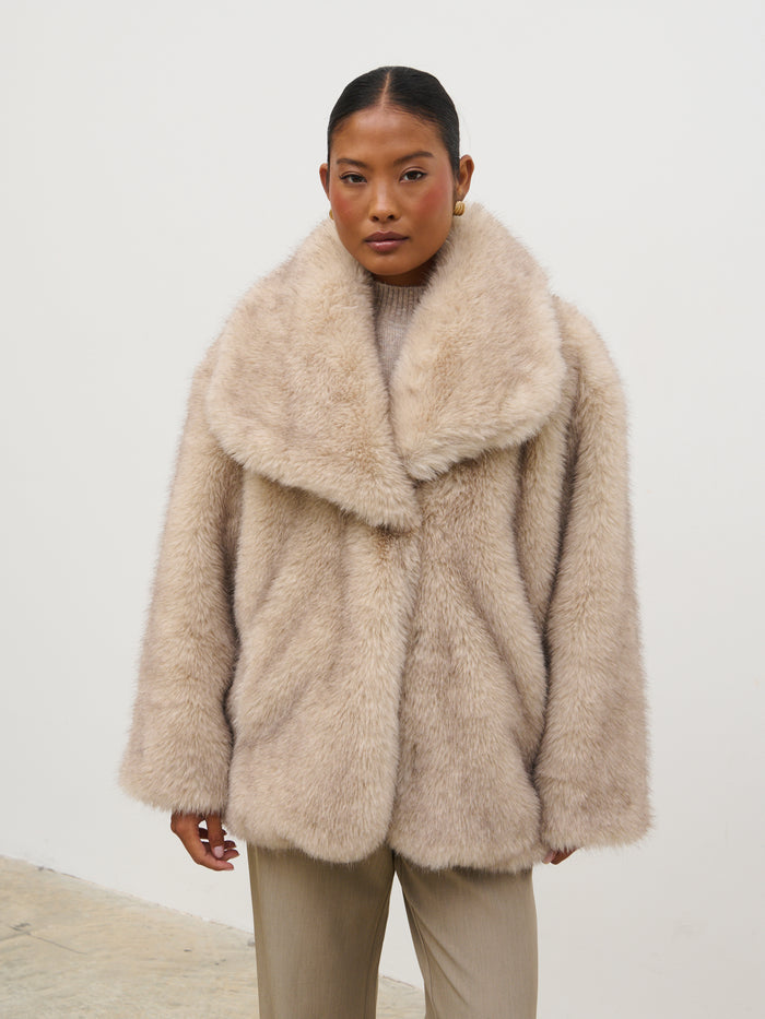 Elle Is 5'3" & Wears Size UK XS|Agatha Short Faux Fur Coat - Beige Marl