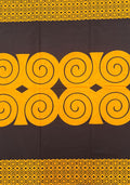 ankara wax print in black and orange-gold
