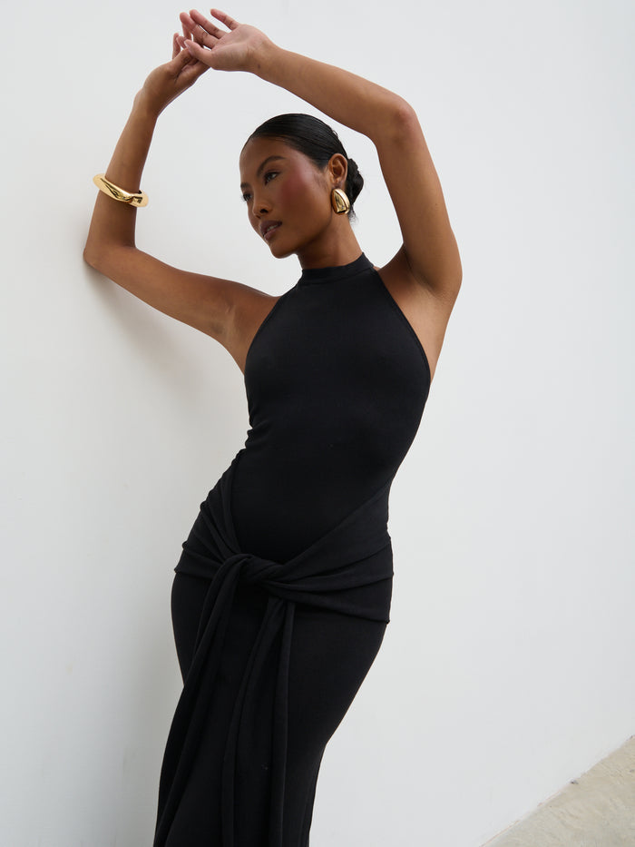 Elle Is 5'3" & Wears Size UK XS|Bernelle Halterneck Tie Waist Knit Midaxi Dress - Black