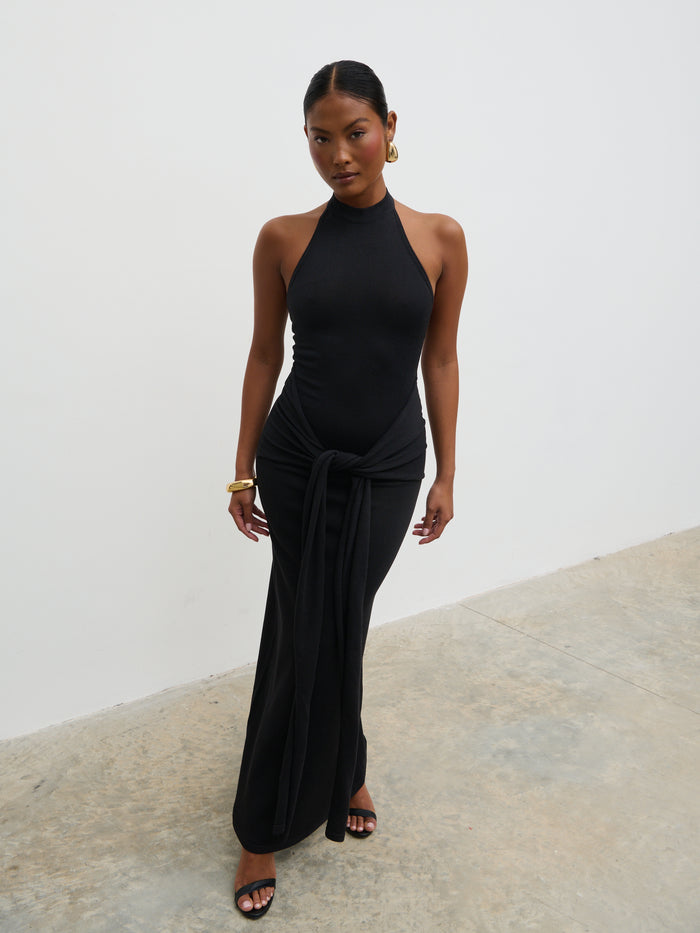 Elle Is 5'3" & Wears Size UK XS|Bernelle Halterneck Tie Waist Knit Midaxi Dress - Black