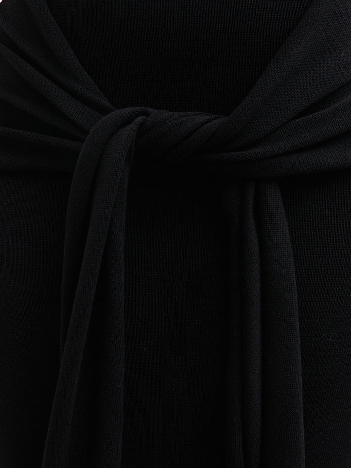Elle Is 5'3" & Wears Size UK XS|Bernelle Halterneck Tie Waist Knit Midaxi Dress - Black