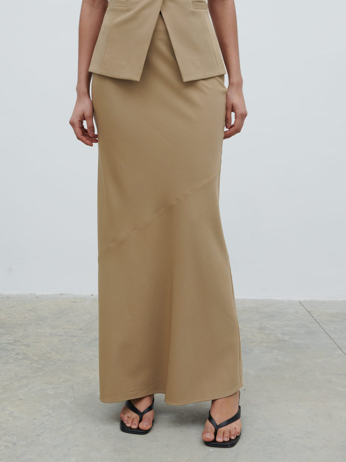 Graziela Is 5'9.5" & Wears Size UK 8|Jean Asymmetric Maxi Skirt - Camel Beige