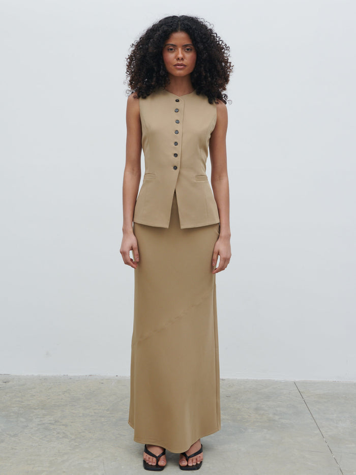 Graziela Is 5'9.5" & Wears Size UK 8|Jean Asymmetric Maxi Skirt - Camel Beige