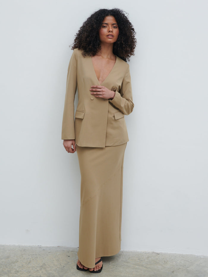 Graziela Is 5'9.5" & Wears Size UK 8|Jean Asymmetric Maxi Skirt - Camel Beige