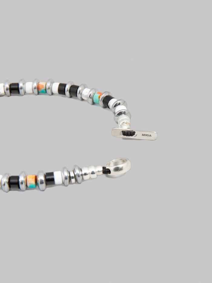 Mikia Hematite Roundel Bracelet Jet Turquoise clasp