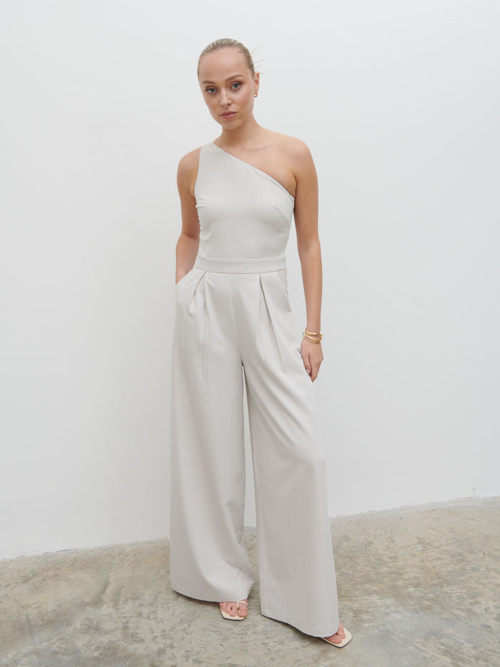 Noor Is 5'8.5" & Wears Size UK 8|Natalie One Shoulder Jumpsuit - Stone