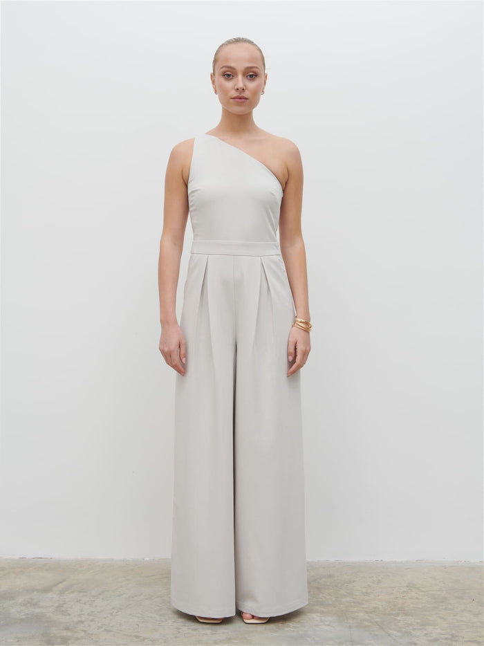 Noor Is 5'8.5" & Wears Size UK 8|Natalie One Shoulder Jumpsuit - Stone