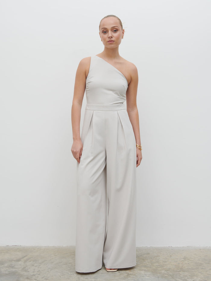 Noor Is 5'8.5" & Wears Size UK 8|Natalie One Shoulder Jumpsuit - Stone