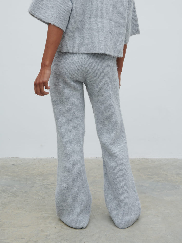 Elle Is 5'3" & Wears Size UK XS|Ovalie Rib Knit Trousers - Grey Marl