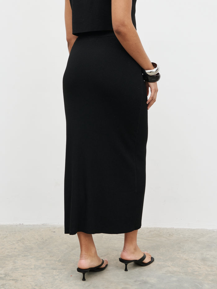 Celeste is 5'7.5" & Wears Size UK S|Reese Midaxi Knit Skirt - Black