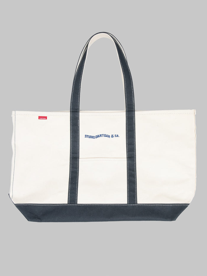 Studio DArtisan 7575 25oz Canvas Tote Bag Ivory Navy front logo